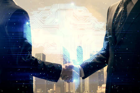 Double exposure of brain hologram and handshake of two men. Partnership in IT industry concept.の写真素材