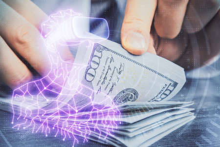 Multi exposure of vr glasses drawing hologram and USA dollars bills and man hands.の写真素材