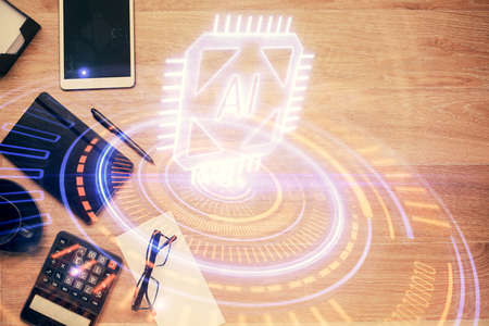 Double exposure of technology theme drawing over work table desktop. Top view. Global data analysis...