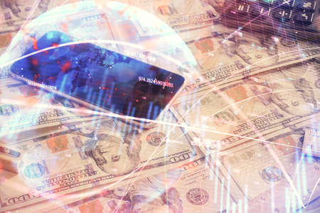 Double exposure of forex graph drawing over us dollars bill background. Concept of financial...