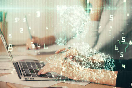 Double exposure of woman hands working on computer and data theme hologram drawing. Tech concept.
