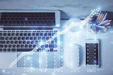 Multi exposure of forex graph drawing over desktop background with computer. Concept of financial analysis. Top view.の写真素材