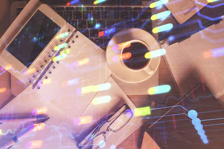 Double exposure of technology theme drawing over work table desktop. Top view. Global data analysis concept.の写真素材