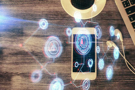 Double exposure of technology theme drawing over work table desktop. Top view. Global data analysis concept.の写真素材