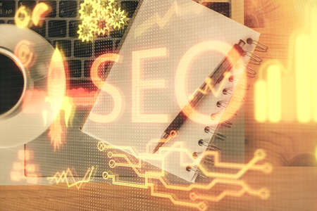 Double exposure of SEO drawing and table top veiw. Concept of search optimization.の写真素材