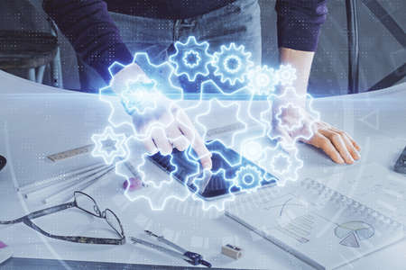 Double exposure of mans hands holding and using a phone and international business theme drawing.