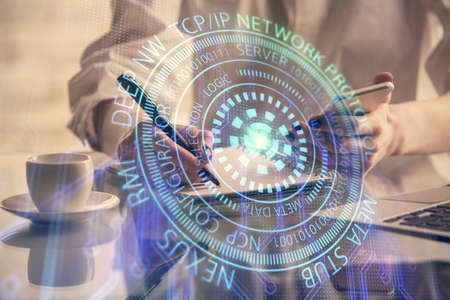 Double exposure of technology sketch hologram and woman holding and using a mobile device. Ai...