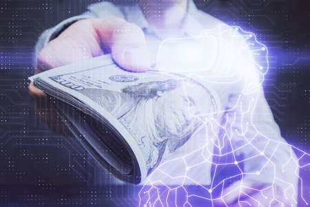 Multi exposure of vr glasses drawing hologram and USA dollars bills and man hands.の写真素材