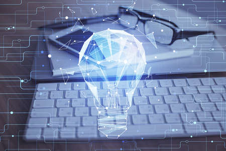 Double exposure of bulb drawing and cell phone background. Concept of ideaの写真素材