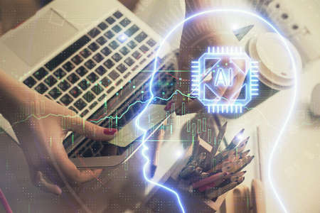 Multi exposure of woman hands working on computer and human brain hologram drawing. Ai tech concept.の写真素材
