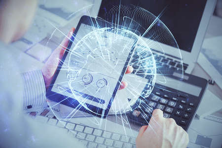 Double exposure of mans hands holding and using a phone and international business theme drawing.の写真素材