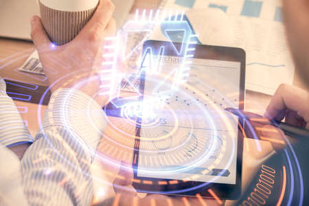 Multi exposure of mans hands holding and using a digital device and data theme drawing. Innovation...