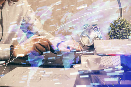 Multi exposure of mans hands holding and using a digital device and data theme drawing. Innovation concept.の写真素材