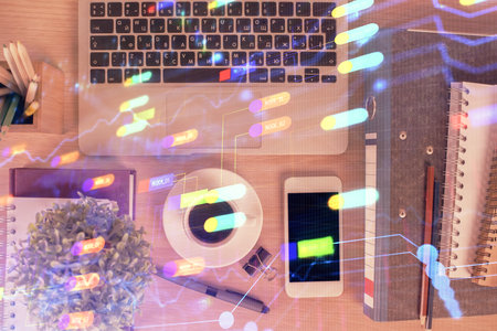 Double exposure of technology theme drawing over work table desktop. Top view. Global data analysis concept.の写真素材