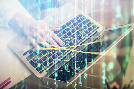 Multi exposure of woman hands working on computer and data theme hologram drawing. Tech concept.