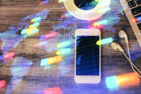 Double exposure of technology theme drawing over work table desktop. Top view. Global data analysis concept.の写真素材