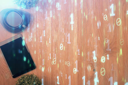 Double exposure of technology theme drawing over work table desktop. Top view. Global data analysis concept.の写真素材