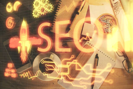 Double exposure of SEO drawing and table top veiw. Concept of search optimization.の写真素材