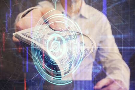 Double exposure of technology drawing hologram and us dollars bills and man hands. Data conceptの写真素材