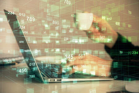 Multi exposure of woman hands working on computer and data theme hologram drawing. Tech concept.