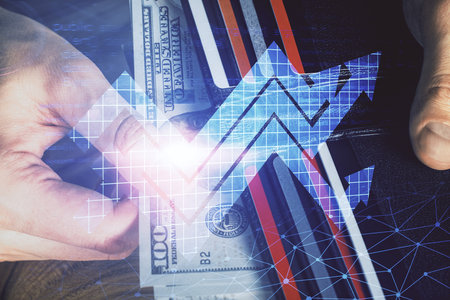 Multi exposure of arrows drawing hologram and USA dollars bills and man hands. Growth concept.の写真素材