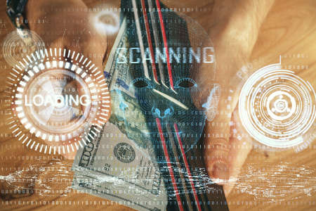 Double exposure of technology drawing hologram and us dollars bills and man hands. Data conceptの写真素材