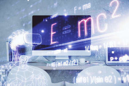 Double exposure of formulas drawing and office interior background. Concept of education.の写真素材