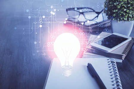 Double exposure of bulb drawing and cell phone background. Concept of ideaの写真素材