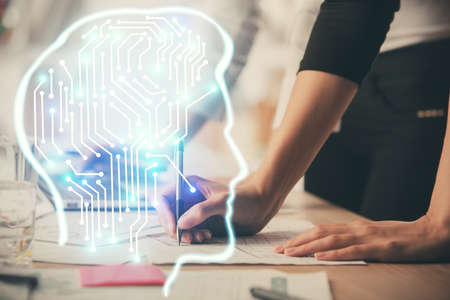 Multi exposure of woman hands working on computer and brain hologram drawing. Ai concept.