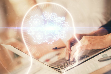 Double exposure of woman hands working on computer and brain hologram drawing. Ai concept.