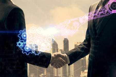 Double exposure of data theme hologram and handshake of two men. Partnership in IT industry concept.の写真素材
