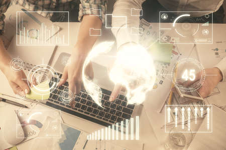 Multi exposure of man and woman working together and forex graph hologram drawing. Financial...
