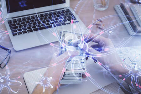 Multi exposure of neuron drawing hologram and USA dollars bills and man hands. Education