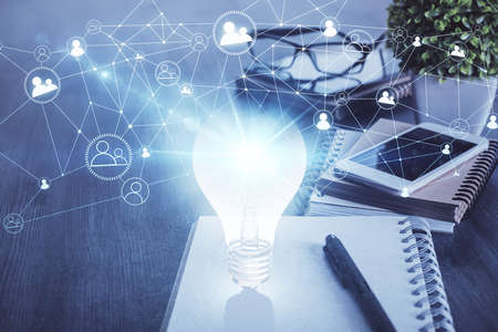 Double exposure of bulb drawing and cell phone background. Concept of ideaの写真素材