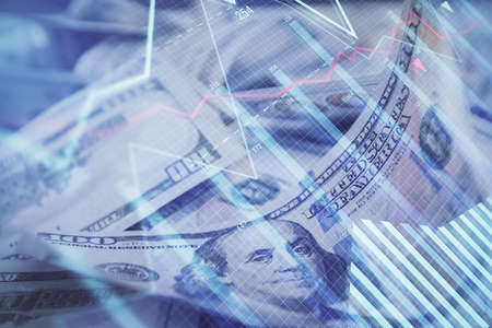 Double exposure of forex graph drawing over us dollars bill background. Concept of financial markets.の写真素材