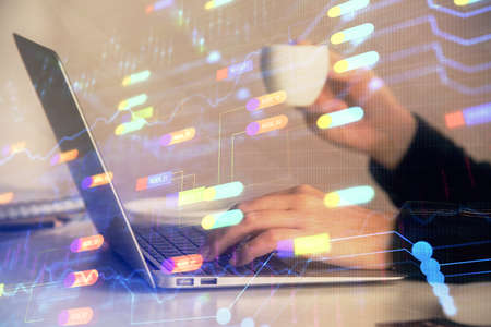 Multi exposure of woman hands working on computer and data theme hologram drawing. Tech concept.の写真素材