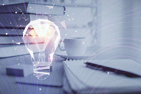 Double exposure of bulb drawing and desktop with coffee and items on table background. Concept of...