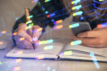 Multi exposure of woman hands working on computer and data theme hologram drawing. Tech concept.の写真素材