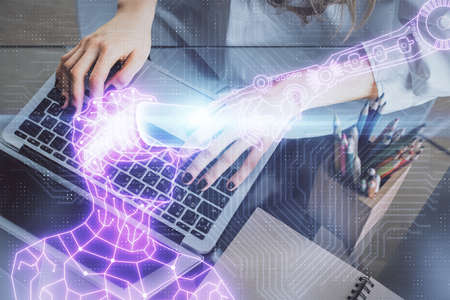 Double exposure of woman hands typing on computer and man in AR glasses drawing. Education concept.