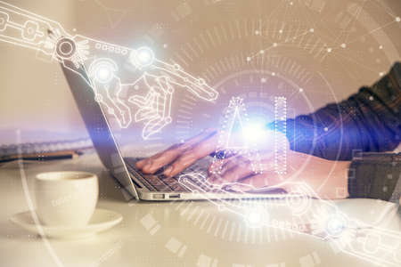 Multi exposure of woman hands working on computer and data theme hologram drawing. Tech concept.