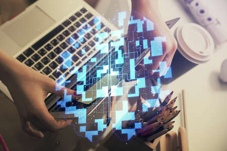 Multi exposure of woman hands working on computer and data theme hologram drawing. Tech concept.