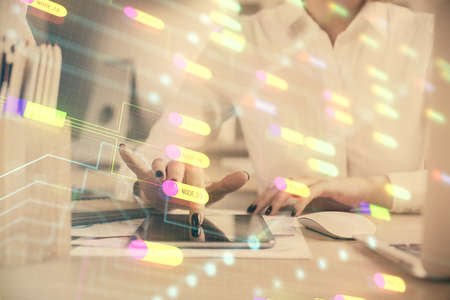 Double exposure of technology sketch hologram and woman holding and using a mobile device. Ai...