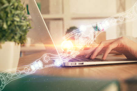 Double exposure of woman hands working on computer and data theme hologram drawing. Tech concept.