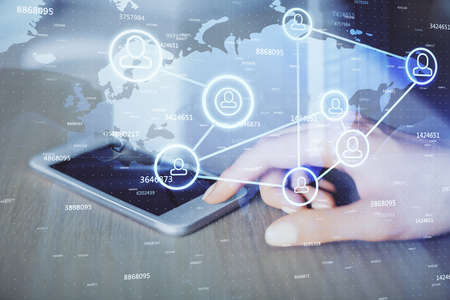 Double exposure of social network sketch hologram and woman holding and using a mobile device.