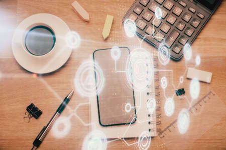 Multi exposure of technology theme drawing over work table desktop. Top view. Global data analysis concept.の写真素材