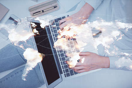 Double exposure of woman hands working on computer and financial theme hologram drawing. Top View....