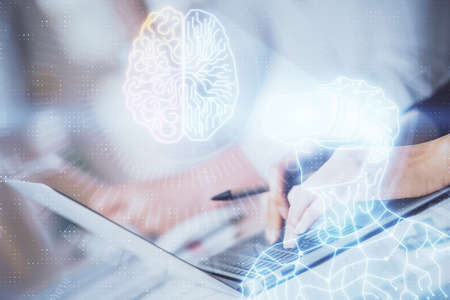 Double exposure of woman hands typing on computer and man in AR glasses drawing. Education concept.の写真素材