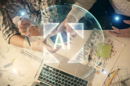 Double exposure of data theme hologram drawing and man and woman working together holding and using...