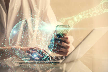 Double exposure of technology sketch hologram and woman holding and using a mobile device. Ai...