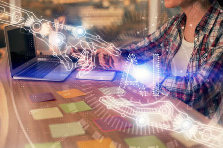Multi exposure of woman hands working on computer and data theme hologram drawing. Tech concept.の写真素材